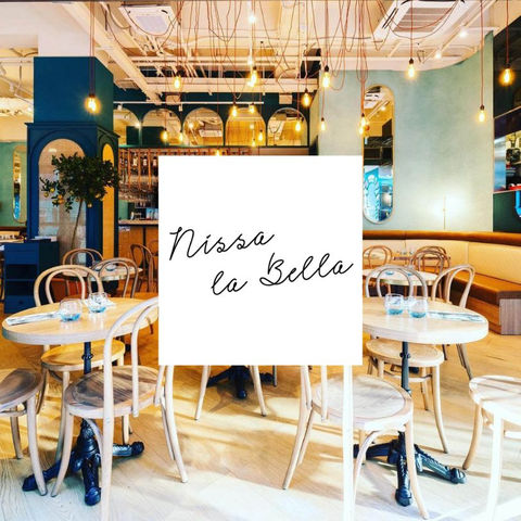 Chic bistro interior with French-Med flair