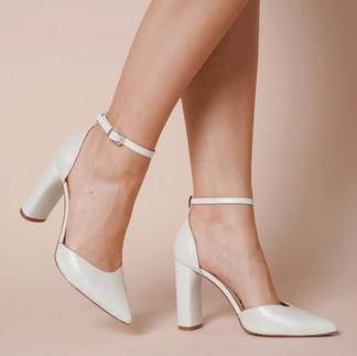 Charlotte Mills London classic Ivory leather point toe bridal shoes with ankle strap and slim block heel.