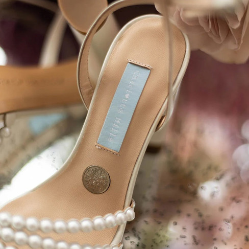 Charlotte Mills shoe with sixpence inside