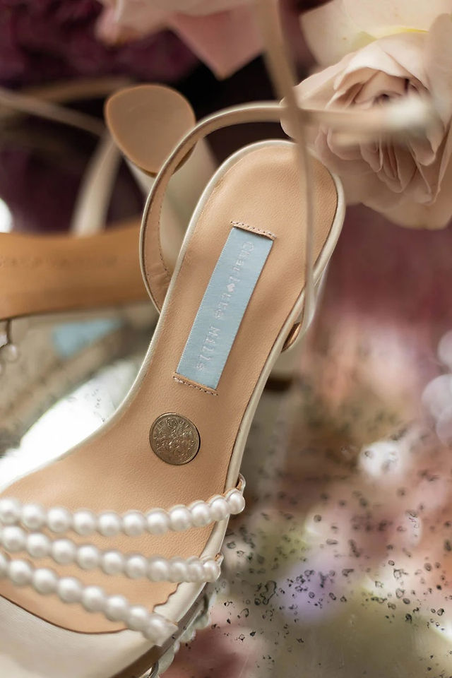 Charlotte Mills shoe with sixpence inside