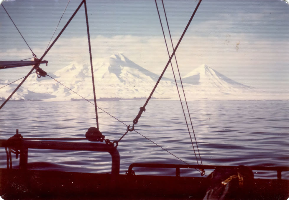 Pavlof Volcano and Pavlof Sister on a rare glassy calm winter day, Pavlof Bay, Alaska Peninsula.