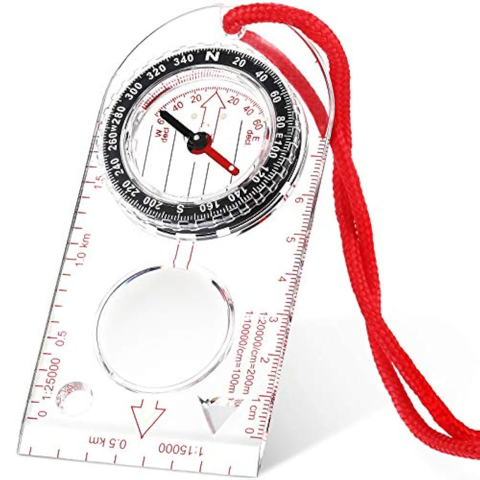 Boussole de navigation Skylety avec loupe et cordon rouge.