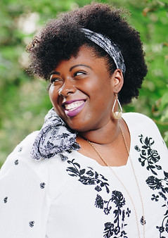 smiling woman looking on right side during daytime_edited.jpg