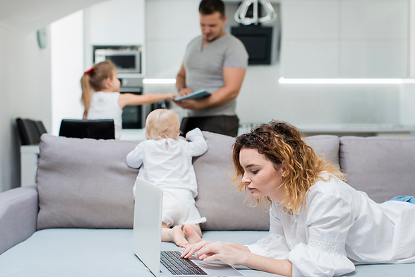 medium-shot-woman-working-on-couch.png
