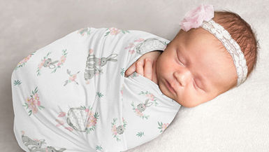 Swaddling, the SNOO, and What They Mean for Your Baby’s Development