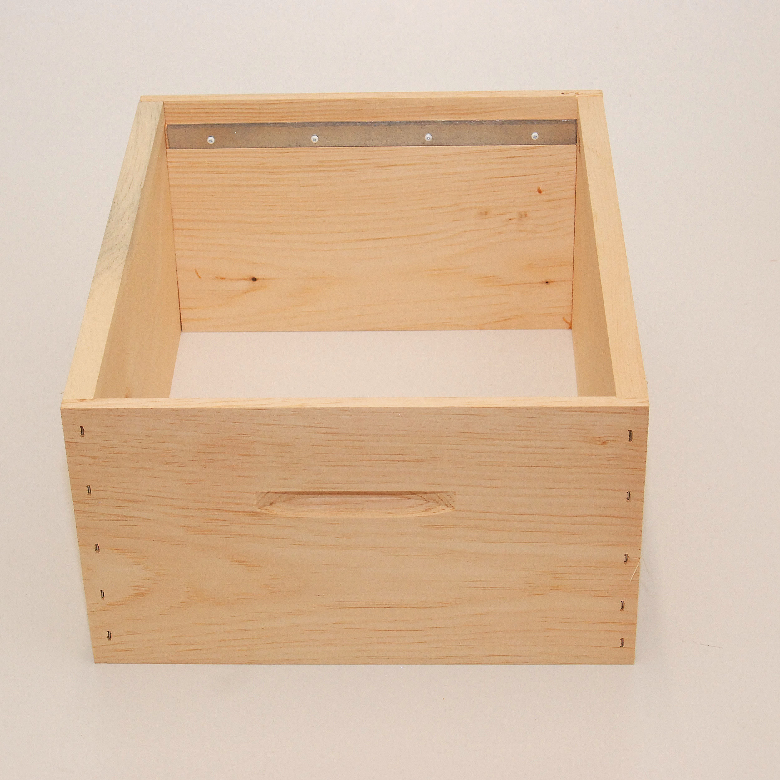 Locally made deep wooden supers.