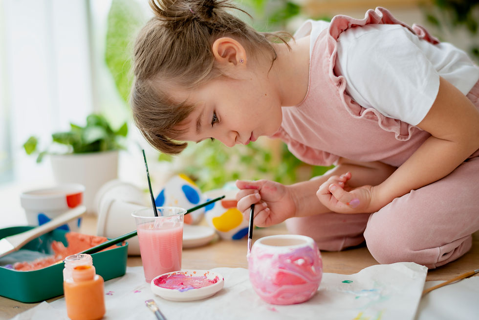 child-painting-a-small-jar-in-a-home-setting-2026-09-15-20-04-59-utc (1).jpg