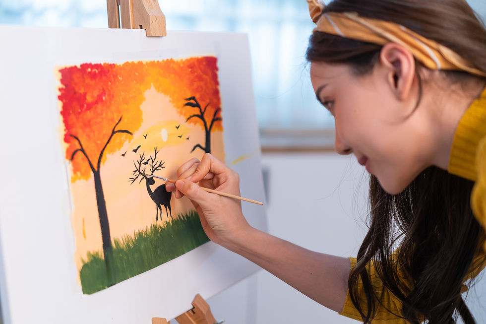 young-woman-painting-a-landscape-scene-on-canvas-2026-01-09-07-09-57-utc.jpg