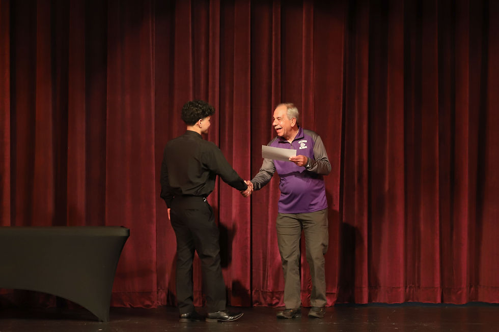 Each year since 2010, Al Yarcho has traveled to Pittsburg from Ohio to award the Wayne B. Yarcho Memorial Scholarship in memory of his father, whose grandfather was the postmaster in Pittsburg in the early 1900s. Wayne was achampion runner and in later years, became a champion race walker. This scholarship is given to a student on the PHS Track and Field Team who shares his passion. This year's recipient was Joshua Hamilton.