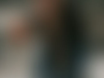 couple running through he snow in NYC