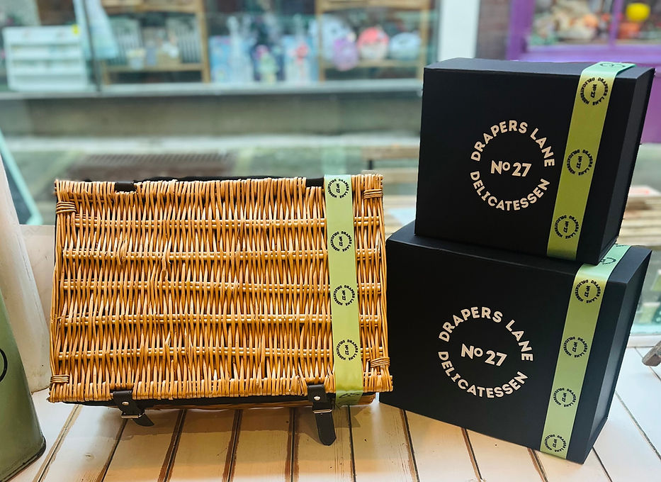Three gorgeous hampers in window