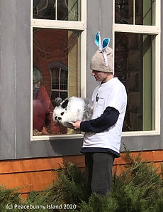 Caleb at window with Moostasha c.jpg