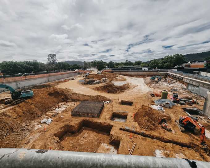 Ellipse Surveying surveyor helping a homeowner on site in Canberra