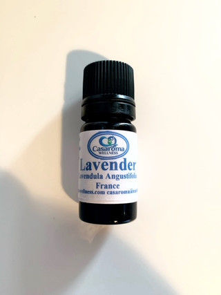 brown bottle with white label that say Lavender with Casaroma Logo