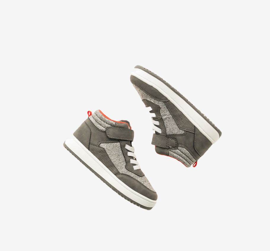 Pair of gray sneakers with white soles against a white background.