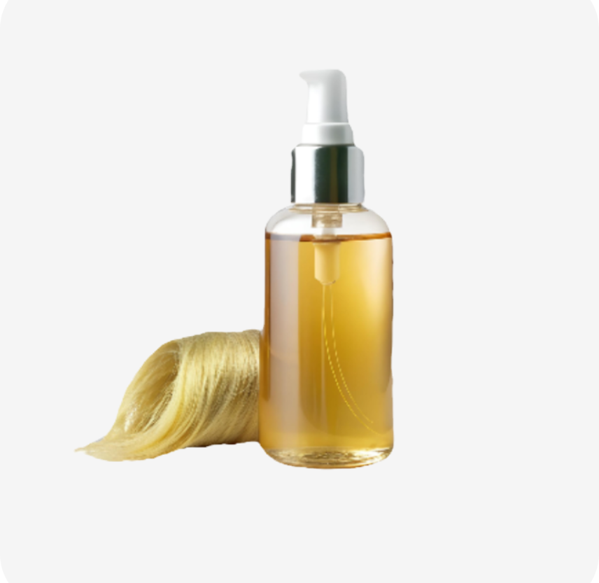 Oil bottle next to blonde hair strand