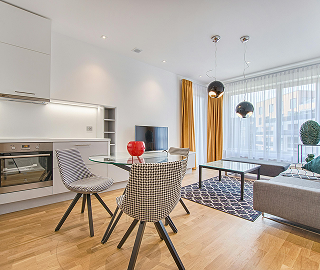 Modern living room with kitchen and dining area