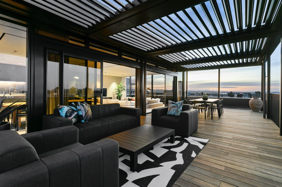 A show-stopping outdoor area at France Street apartment designed by Kerri, with soft textures and a calm, modern atmosphere