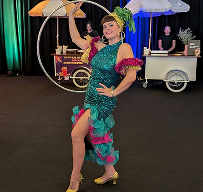 Hula hoop roving performer entertaining guests at a corporate event in Melbourne