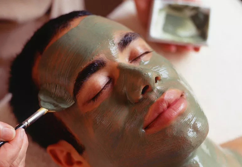 A man getting a facial