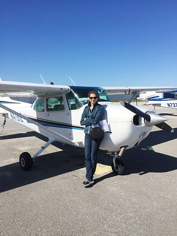 Alex-standing-by-plane.jpg