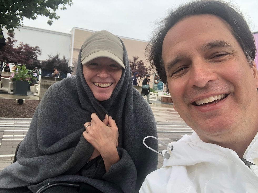 Frank and Cindy dodge the cold, rainy weather in the afternoon.