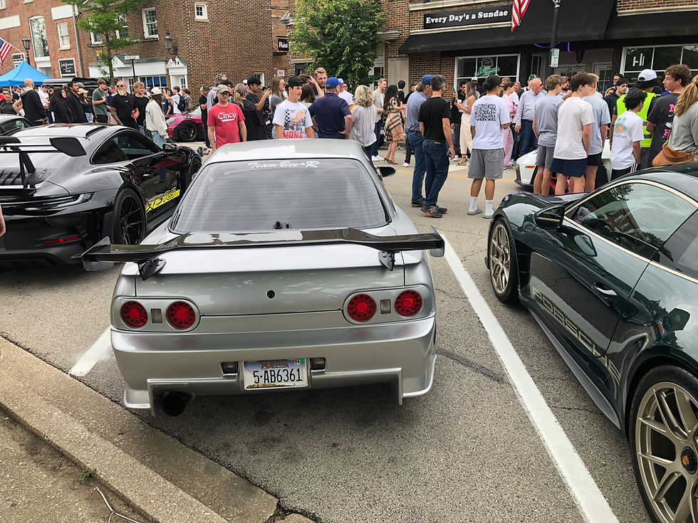 The crowds showed up for the display of cars at Burdi.