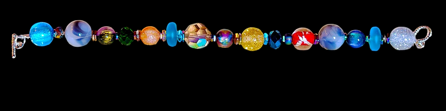 Multi-colored glass and resin bead bracelet with toggle clasp