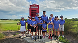 Junior golfers of different ages standing with age-appropriate golf club sets at Royal St.