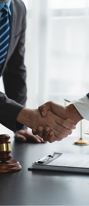 stock-photo-businessmen-investors-shake-hands-with-lawyers-to-sign-partnership-agreements-