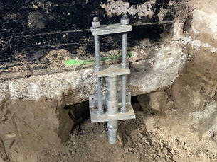 helical piles used to fix a home foundation