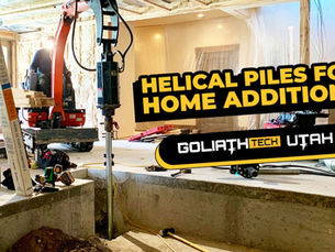 helical piles being installed on a home addition