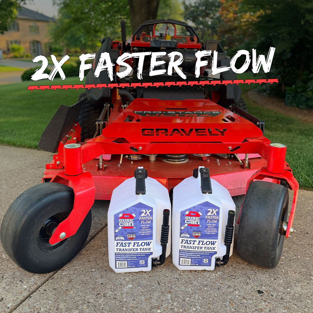 fast flow transfer tanks sitting in front of a mower