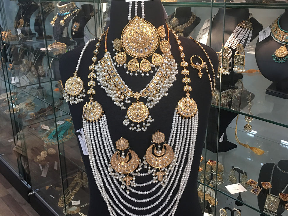 Thumbnail: Fatima 22k Gold plated Kundan and Pearls Royal Bridal Set 
