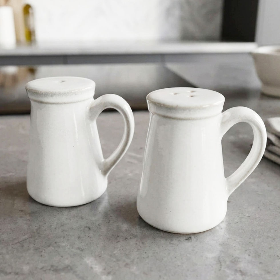 white salt and pepper dispensers