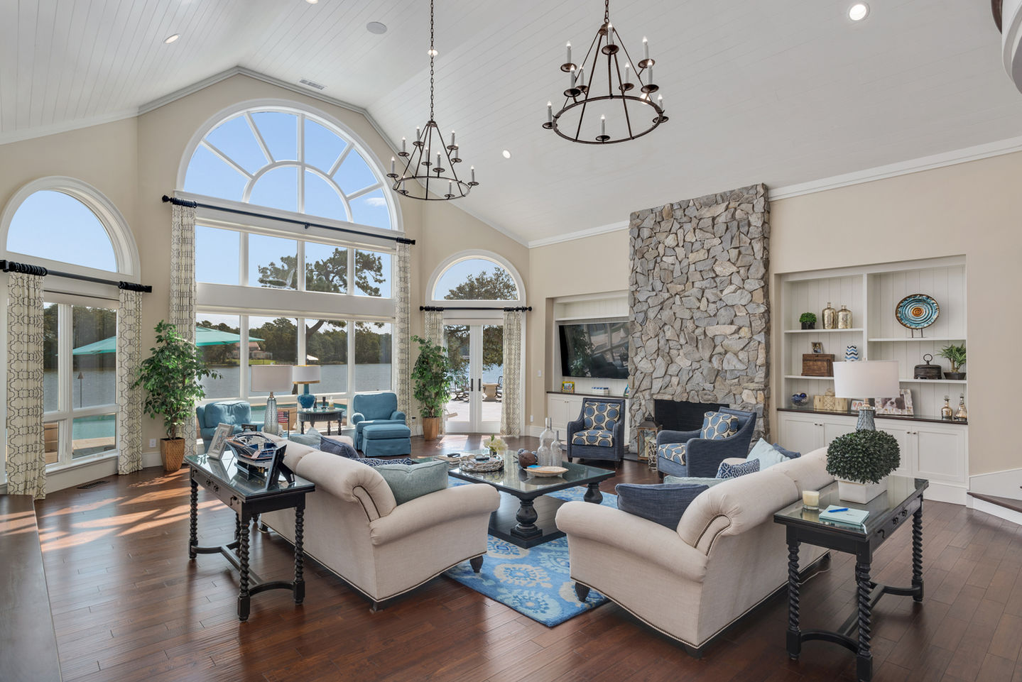 Coastal Living Room with Floor to Stone Fire Place