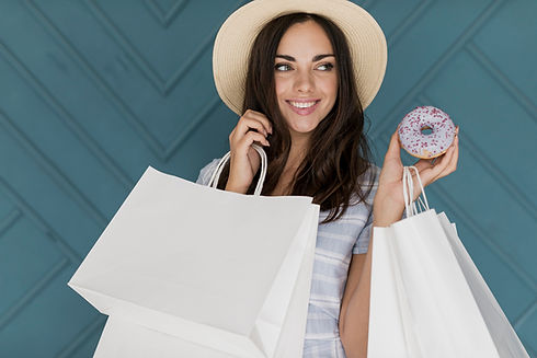 cheerful-young-woman-with-hat-donut.jpg