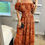 Thumbnail: Orange Leopard Bardot Maxi Dress