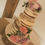 Thumbnail: 3 tier naked/semi naked wedding cake with fresh flowers
