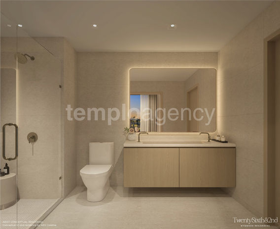 Baño de una residencia con lavabo, espejo y acabados en tonos claros