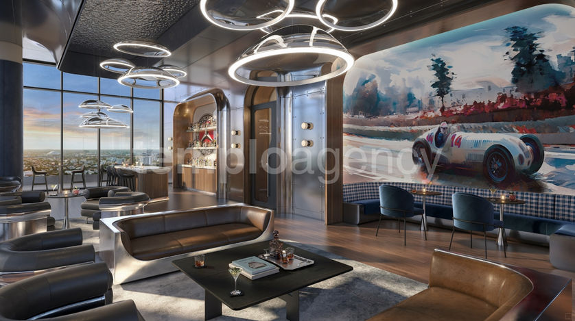 Salón inspirado en Mercedes-Benz y la Fórmula 1, con una obra de arte de un automóvil de carreras