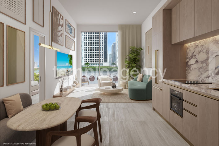 Sala, comedor y cocina abierta en una residencia de Viceroy Brickell