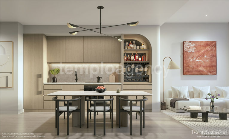 Cocina abierta con isla junto a la sala de una residencia amueblada