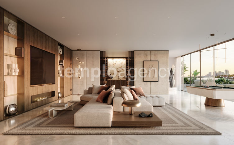 Sala con chimenea, ventanales y terraza con vista a la bahía.