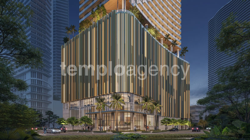 Render nocturno de la fachada del podio y acceso principal de Edge House Miami.