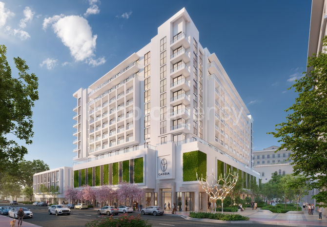 Vista exterior de Cassia, edificio residencial con terrazas y áreas verdes en Coral Gables