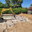 Thumbnail: a bulldozer moving around dirt on the construction site