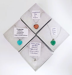 turquoise, goldstone, jad and angelaura quartz one inch heart pendant necklaces.