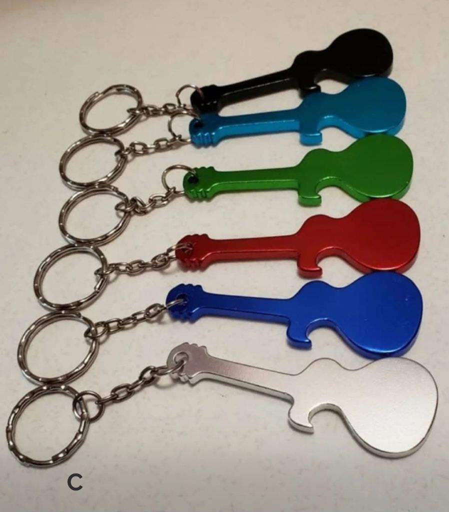 Thumbnail: Metal Guitar key holder and bottle opener. Comes in different colours.