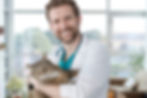 Veterinarian Holding Cat